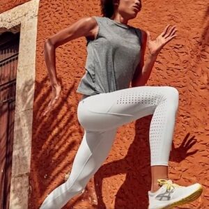 Athleta Contender Laser cut 7/8 tights M